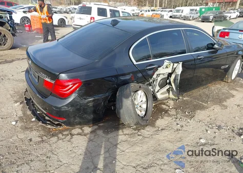 2015 BMW 740Li xDrive из США, поврежденный, VIN WBAYF4C53FD874101